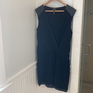 Black sleeveless dress with personality for a night out.